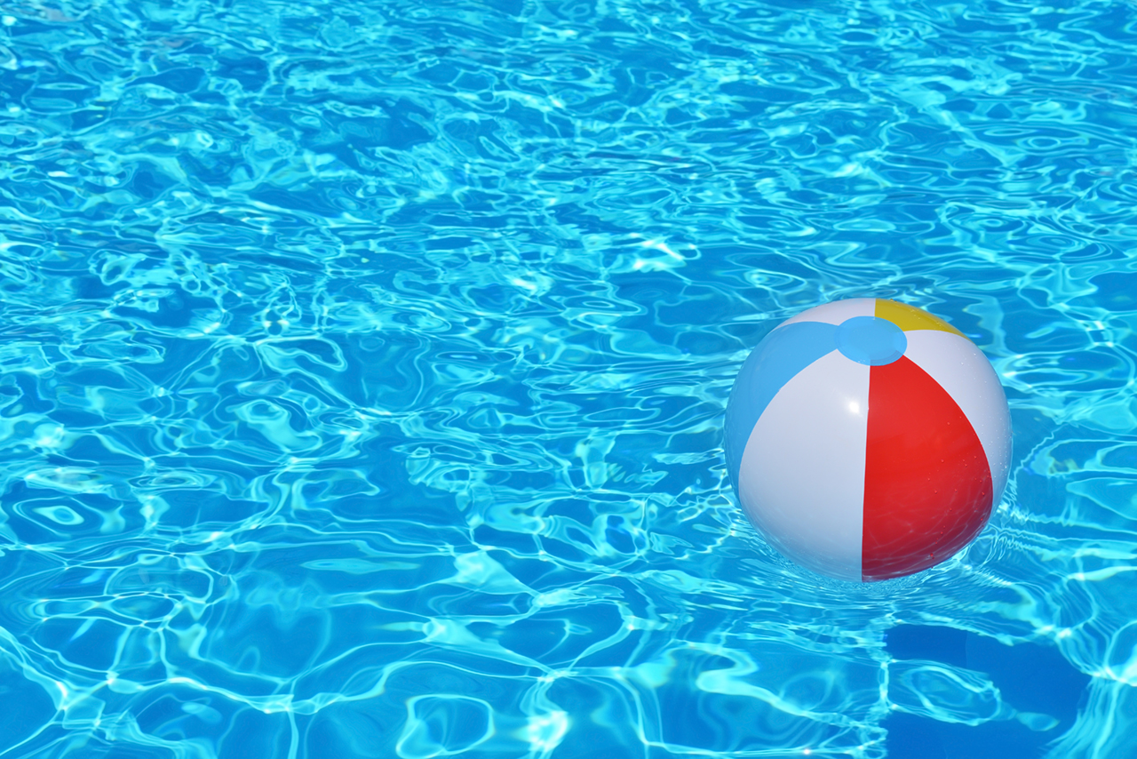 Colorful-inflatable-ball-floating-in-swimming-pool